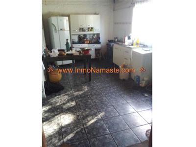 Casa con Salón a la Calle